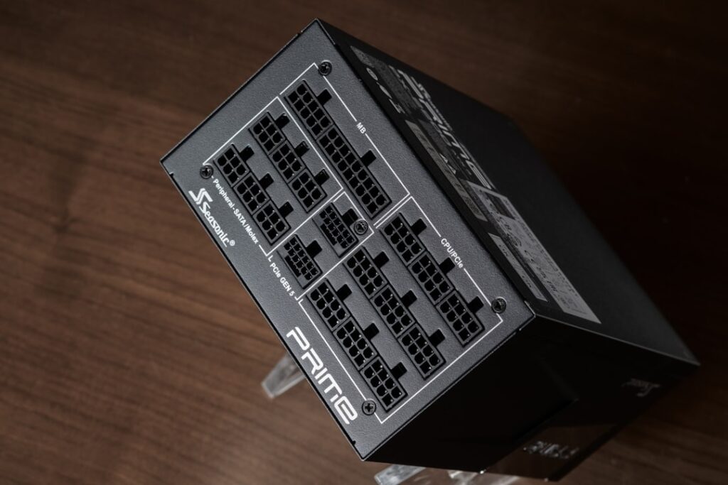 A black box sitting on top of a wooden table